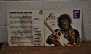 A Jimi Hendrix BBC sessions album on purple vinyl with poster