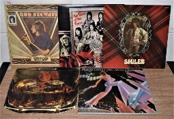 A lot of four Rod Stewart albums and a Faces compilation