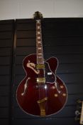 A Samich Greg Bennett 17' Archtop, solid spruce top, wine red , Duncan design pickups, grover