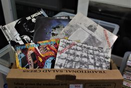 A lot of approximately 50 singles with records by the Jam , the Police , SLF , Stranglers ,