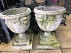 A pair of large concrete garden urns, height approx. 73cm