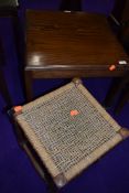 A vintage squarre occasional castered table and a strung stool