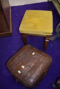 A reproduction dressing table stool and a vintage leather pouffe