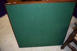 A traditional folding card table