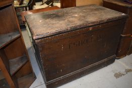 A vintage stained frame blanket box, bears name E S Holland, later green beize lined interior,