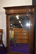 A Victorian oak framed large overmantel or hall mirror, having column supports, approx. 154 x 100cm