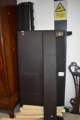 A modern brown leatherette double bed frame