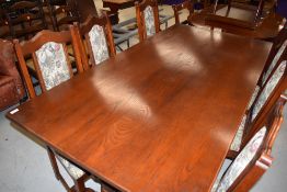 A modern Old Charm or similar refectory table and six dining chairs