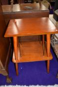 A modern stained frame rack table, possibly for vinyl records and turntable