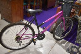 An Aurora challenge mountain bike , fixed frame