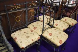 A set of six modern metal frame dining chairs and a similar glass topped coffee table
