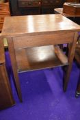 An early 20th Century oak side table with ply undertier, width approx. 56cm