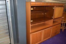 A vintage teak effect laminate wall unit, dimensions approx. W150cm H130cm