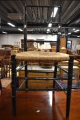 A Victorian simulated bamboo ebonised bedroom chair having rush seat