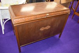 A mid 20th Century oak and ply blanket box , on casters