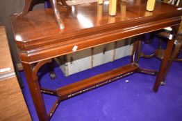 A reproduction hardwood console table, approx. 110cm width