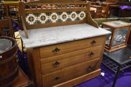 A Victorian marble top washstand having tiled back, width approx. 111cm