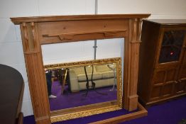 A traditional pine fire surround and similar fender, width approx. 132cm