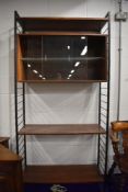 A vintage Ladderax rosewood effect shelving unit having display section