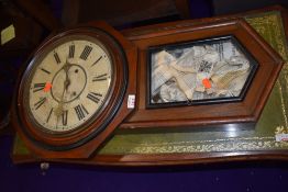 A late 19th/early 20th Century part mahogany cased wall clock, enamelled face worn, possibly