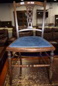 An Edwardian mahogany and inlaid bedroom chair of small proportions, probably a child's, having