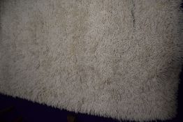 A vintage shag pile rug, approx. 240 x 170cm