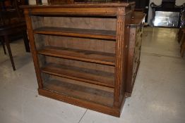 An early 20th Century oak bookcase, width approx. 107cm