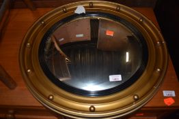 A vintage convex wall mirror, diameter 52cm