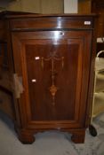 An Edwardian mahogany and inlaid corner cupboard, on bracket feet, height approx. 102cm