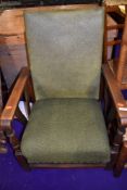 A 1930s stained frame recliner armchair