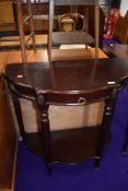A reproduction mahogany effect hall table, width approx. 78cm