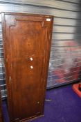 A vintage stained frame narrow cupboard
