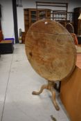 A Victorian tilt top table, restoration project, diameter approx. 84cm