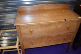 An early 20th Century golden oak bedroom chest of two drawers, width approx. 95cm, nicely made