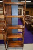 A reproduction hardwood whatnot/etage style open bookshelf, approx. Height 155cm W56cm D26cm