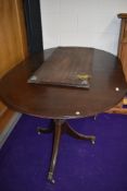 A Regency style extending dining table, nice quality on brass claw feet and casters, 1 additional