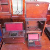 A 19th century mahogany tea caddy with two divisions on lions paw feet together with an oak