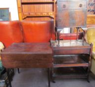 A Victorian mahogany Pembroke table with drop flaps on tapering legs together with an oak tea