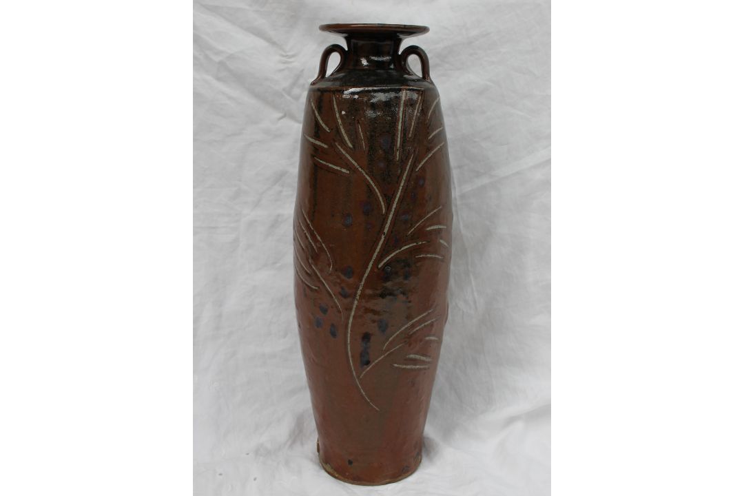 A studio pottery twin handled vase, with a brown ground and incised leaf and floral decoration, - Image 1 of 7