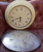 An electroplated gallery tray together with a wall clock