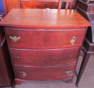 A mahogany chest of drawers with three long drawers on bracket feet