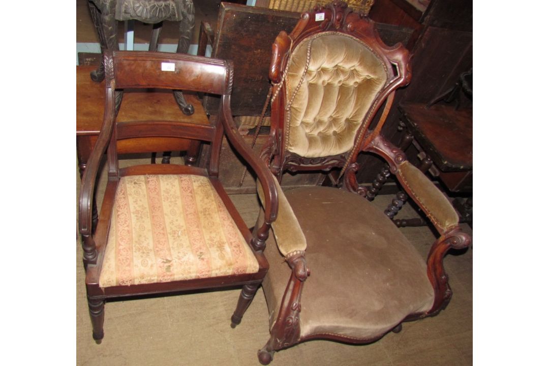 A Victorian walnut framed library chair with a button back upholstered back,