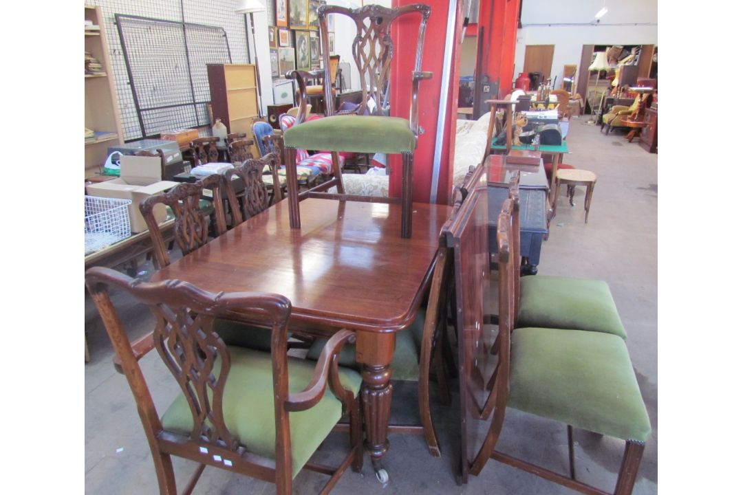 A Victorian mahogany extending dining table with rounded corners on tapering reeded legs, - Image 3 of 3