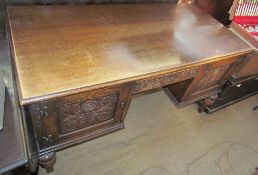A 20th century oak desk,