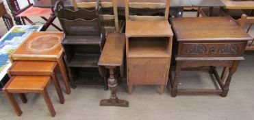A tiled top nest of tables together with an oak Canterbury bookcase, oak side table, oak bedside