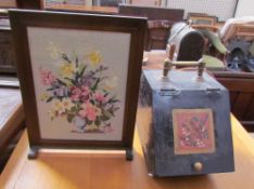 An Arts and Crafts coal box decorated with a song bird together with a woolwork fire screen