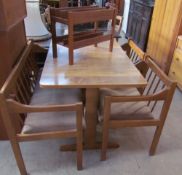 A 20th century modern kitchen dining table, bench and two chairs together with a teak magazine rack