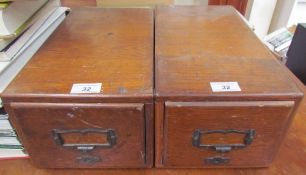 A pair of walnut record card filing cabinets