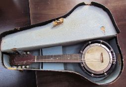 An eight string banjo / mandolin, with case