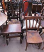 A Queen Anne style mahogany elbow chair together with a spindle back dining chair, a church chair